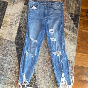 Ripped Light Washed Jeans by American Eagle
